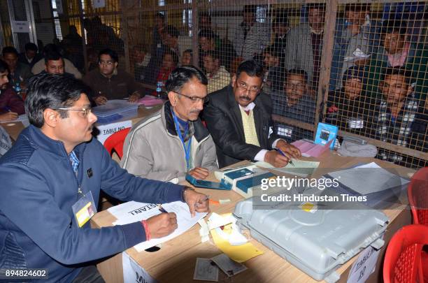 Counting of votes for Assembly elections in progress at a counting centre on December 18, 2017 in Dharamsala, India. In Himachal Pradesh assembly...