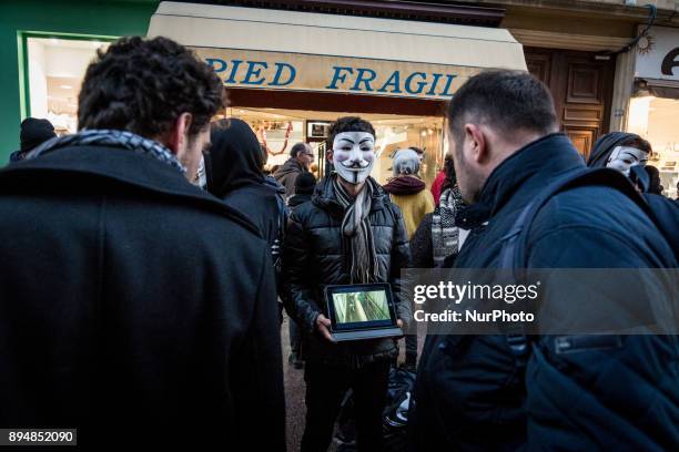 Quot;Cube of Truth&quot; organized by the association Anonymous For The Voiceless in Lyon, France, December 17, 2017. Animal activists broadcast...