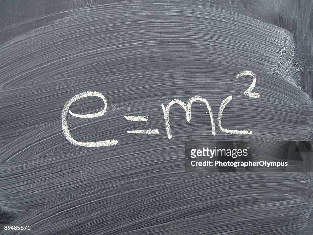 einstein's equation of relativity on blackboard - einstein stock pictures, royalty-free photos & images