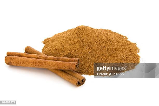 cinnamon on white - cinnamon stock pictures, royalty-free photos & images