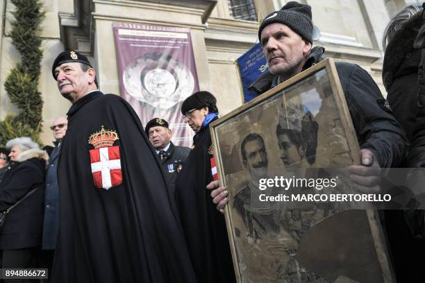 People pay tribute to Victor Emmanuel III of Savoy and his wife Queen Elena of Montenegro on December 18, 2017 at the Regina Montis Regalis Sanctuary...