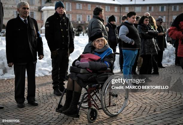 People pay tribute to King Victor Emmanuel III of Savoy and his wife Queen Elena of Montenegro, during a ceremony on December 18, 2017 at the Regina...