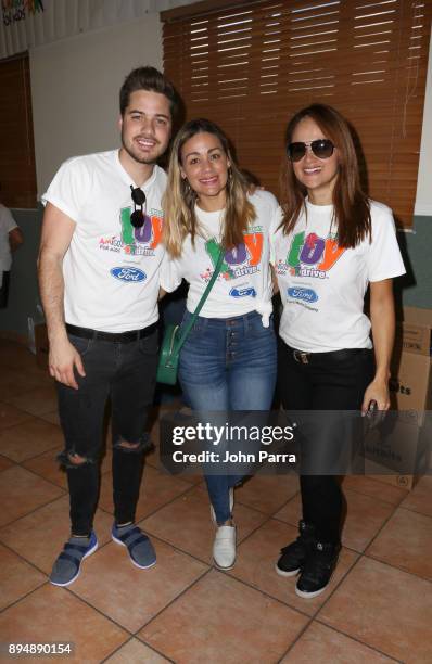 William Valdes, Gloria Ordaz and Jessica Cerezo attend the Branches of Love during Amigos For Kids at the 26th Annual Holiday Toy at Branches of Love...