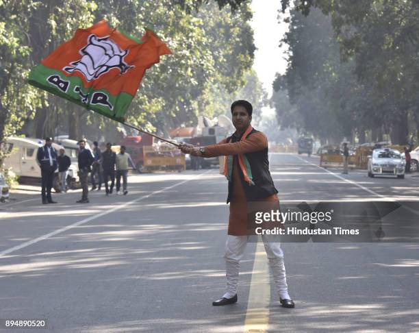 Worker and supporters celebrate after winning Gujarat and Himachal Pradesh Election 2017 at BJP HQ on December 18, 2017 in New Delhi, India. The...