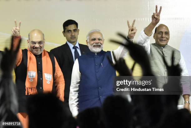 Prime Minister Narender Modi, BJP National President Amit Shah, Rajnath Singh Greets BJP workers and supporters after winning Gujarat and Himachal...