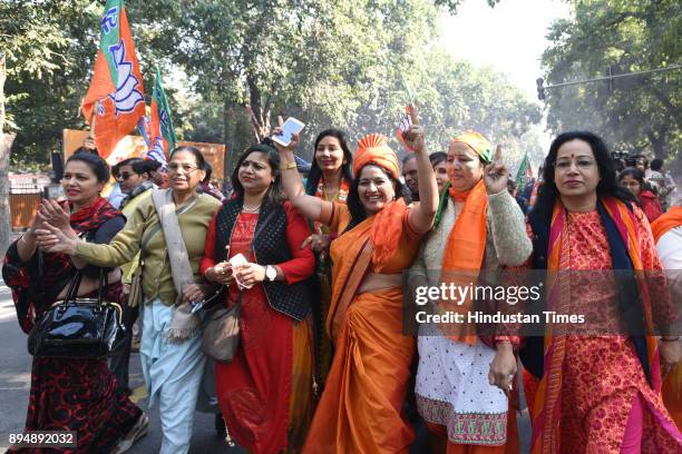 Worker and supporters celebrate after winning Gujarat and Himachal Pradesh Election 2017 at BJP HQ on December 18, 2017 in New Delhi, India. The...