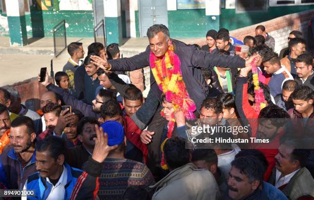 Candidate from Mandi Sadar Anil Sharma celebrates with supporters after win on December 18, 2017 of Mandi, India. In Himachal Pradesh assembly...