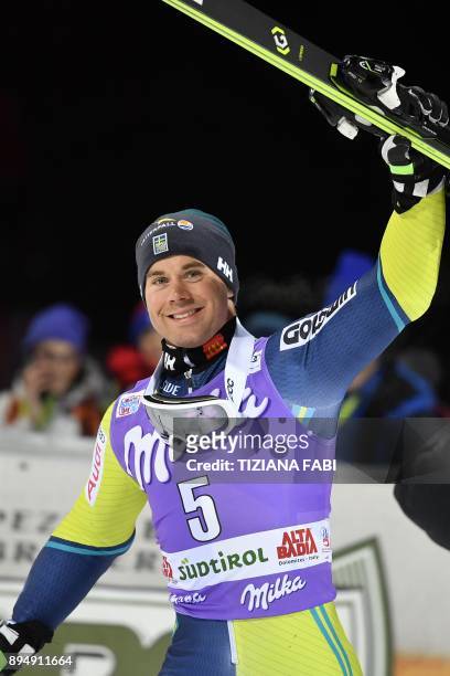 Sweden's Matts Olsson celebrates during the podium ceremony of the FIS Alpine World Cup Men's Parallel Giant Slalom on December 18, 2017 in Alta...