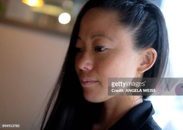 Peruvian Composer and performer Pauchi Sasaki poses for a portrait following an interview with AFP on December 12, 2017 in New York. - Wearing a...