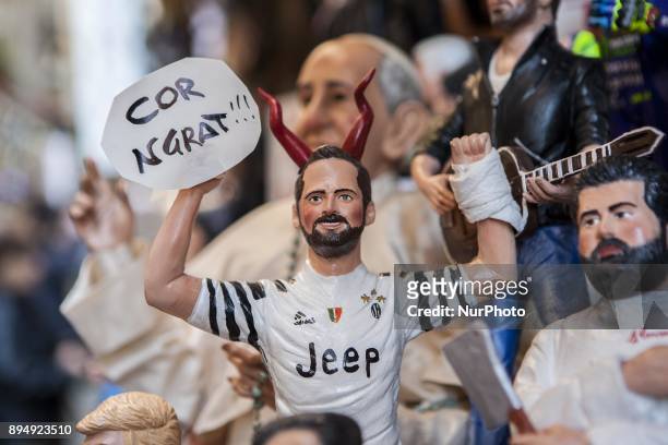 Gonzalo Higuain Ex player of SSC Napoli is seen in 'Via San Gregorio Armeno' in Naples, Italy on December 18, 2017. Various sculptures being sold in...