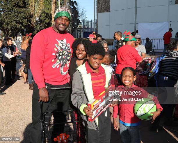 Marcellus Wiley hosts youth at Mayor Brown's 5th Annual Compton Toy Giveaway at MLK Monument on December 17, 2017 in Compton, California.