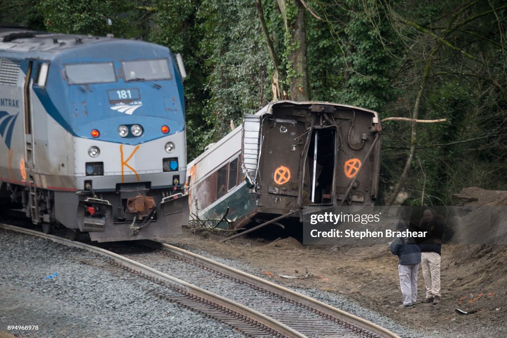 Amtrak Train Derailment South Of Tacoma, Washington Leaves Train Car Dangling Onto Highway