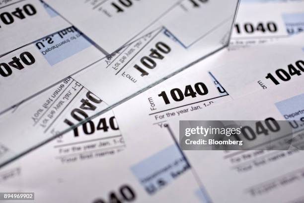 Department of the Treasury Internal Revenue Service 1040 Individual Income Tax forms for the 2016 tax year are arranged for a photograph in Tiskilwa,...