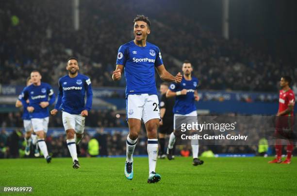 Dominic Calvert-Lewin of Everton celebrates as he scores their first goal during the Premier League match between Everton and Swansea City at...