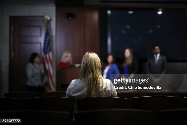 Woman attends a news conference lead by Rep. Carolyn Maloney to introduce the Ending Secrecy About Workplace Sexual Harassment Act in the U.S....