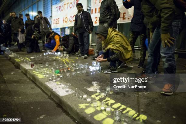 Residents of the area of La Villette, northern Paris, hold rally on December 18, 2017 in front of the enter of the refugee reception platform of...