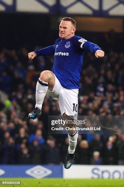 Wayne Rooney of Everton celebrates scoring his side's third goal during the Premier League match between Everton and Swansea City at Goodison Park on...