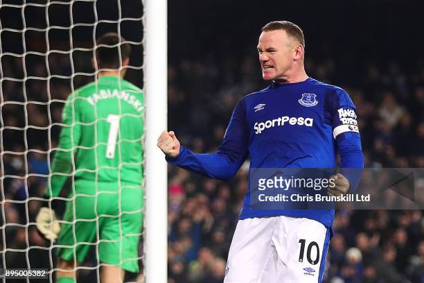 Wayne Rooney of Everton celebrates scoring his side's third goal during the Premier League match between Everton and Swansea City at Goodison Park on...