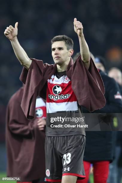 Joahannes Flum of Pauli celebrate after the Second Bundesliga match between FC St. Pauli and VfL Bochum 1848 at Millerntor Stadium on December 18,...