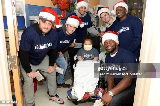 New England Patriot's Trevor Reilly, Jacob Hollister, Derek Rivers, Cody Hollister, Phillip Dorsett, and Dwayne Allen visit Jack at Boston Children's...