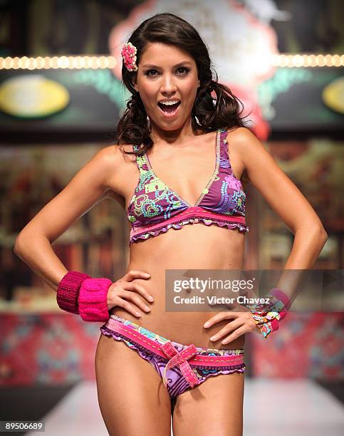 Model walks the runway wearing Agua Bendita during the second day of Colombia Moda 2009 at Plaza Mayor on July 28, 2009 in Medellin, Colombia.