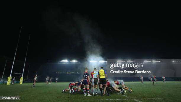 Steam rises as the Harlequins A and Bristol United forwards scrummage during the Aviva A League match between Harlequins A and Bristol United at...