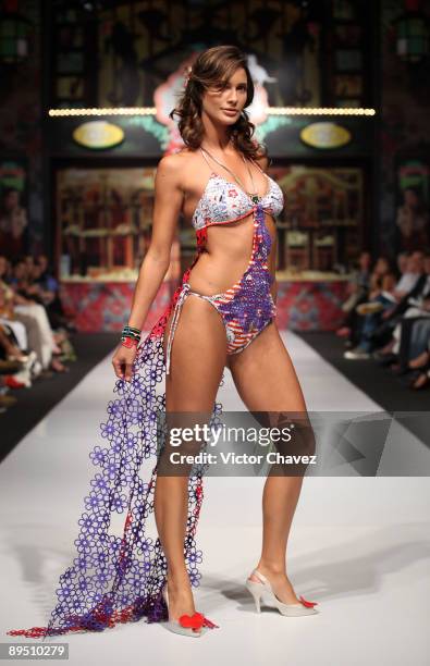 Model walks the runway wearing Agua Bendita during the second day of Colombia Moda 2009 at Plaza Mayor on July 28, 2009 in Medellin, Colombia.