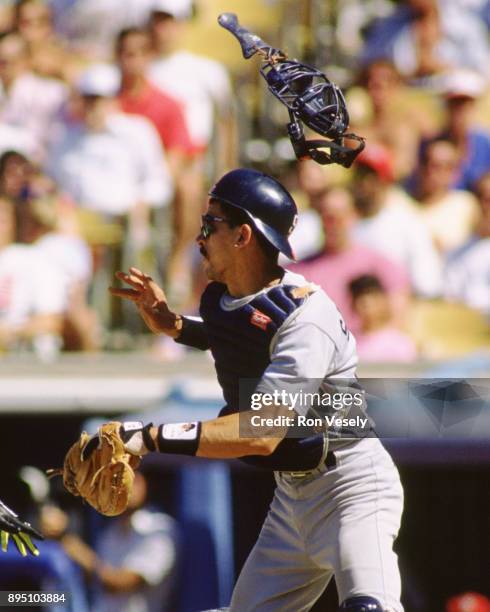 Benito Santiago of the San Diego Padres catches in an MLB game at Dodger Stadium in Los Angeles, California during the 1991 season.