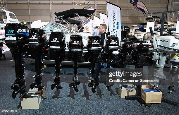 Outboard engines are seen on display at the Sydney International Boat Show at Darling Harbour on July 30, 2009 in Sydney, Australia. A wharf with 190...