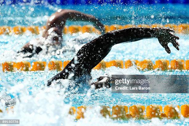 Malia Metella of France competes in the Women's 100m Freestyle Heats during the 13th FINA World Championships at the Stadio del Nuoto on July 30,...