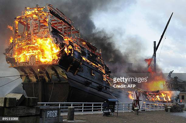 Dutch East India Company replica of the Prince Willem vessel burns in the historical museum harbor in Den Helder on July 30, 2009. The replica was...