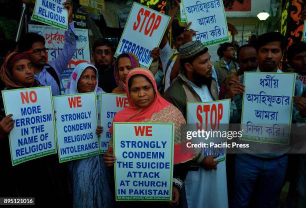 Activists from a Muslim group during a protest to strongly condemn suicide bombers kill nine at Christian church in Pakistan, organised by Sara...