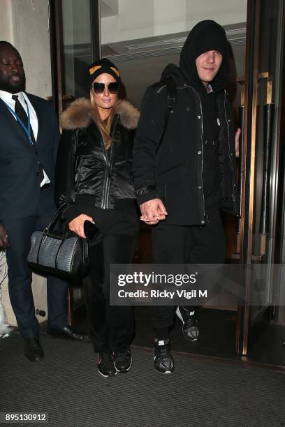 Paris Hilton and boyfriend Chris Zylka seen leaving Mayfair hotel on December 18, 2017 in London, England.