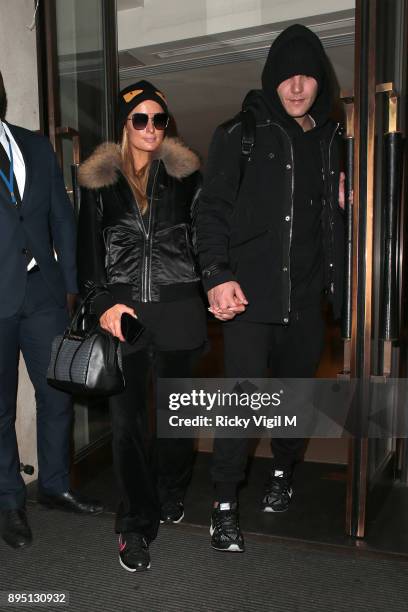 Paris Hilton and boyfriend Chris Zylka seen leaving Mayfair hotel on December 18, 2017 in London, England.