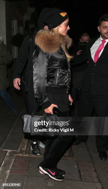 Paris Hilton and boyfriend Chris Zylka seen leaving Mayfair hotel on December 18, 2017 in London, England.