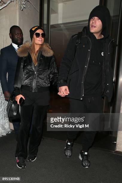 Paris Hilton and boyfriend Chris Zylka seen leaving Mayfair hotel on December 18, 2017 in London, England.