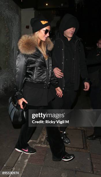 Paris Hilton and boyfriend Chris Zylka seen leaving Mayfair hotel on December 18, 2017 in London, England.