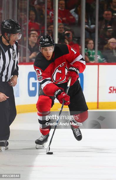 Jimmy Hayes of the New Jersey Devils plays the puck against the Dallas Stars during the game at Prudential Center on December 15, 2017 in Newark, New...