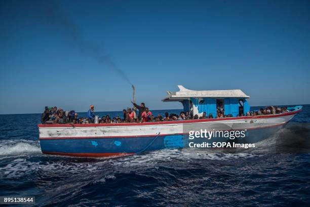 Migrants in a boat that left Libya few hours before being rescued by the Spanish NGO Proactiva Open Arms. The Spanish NGO Proactiva Open Arms rescued...