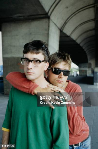 Guitarist Graham Coxon and singer Damon Albarn of English rock band Blur pose under London's Westway, 1995.