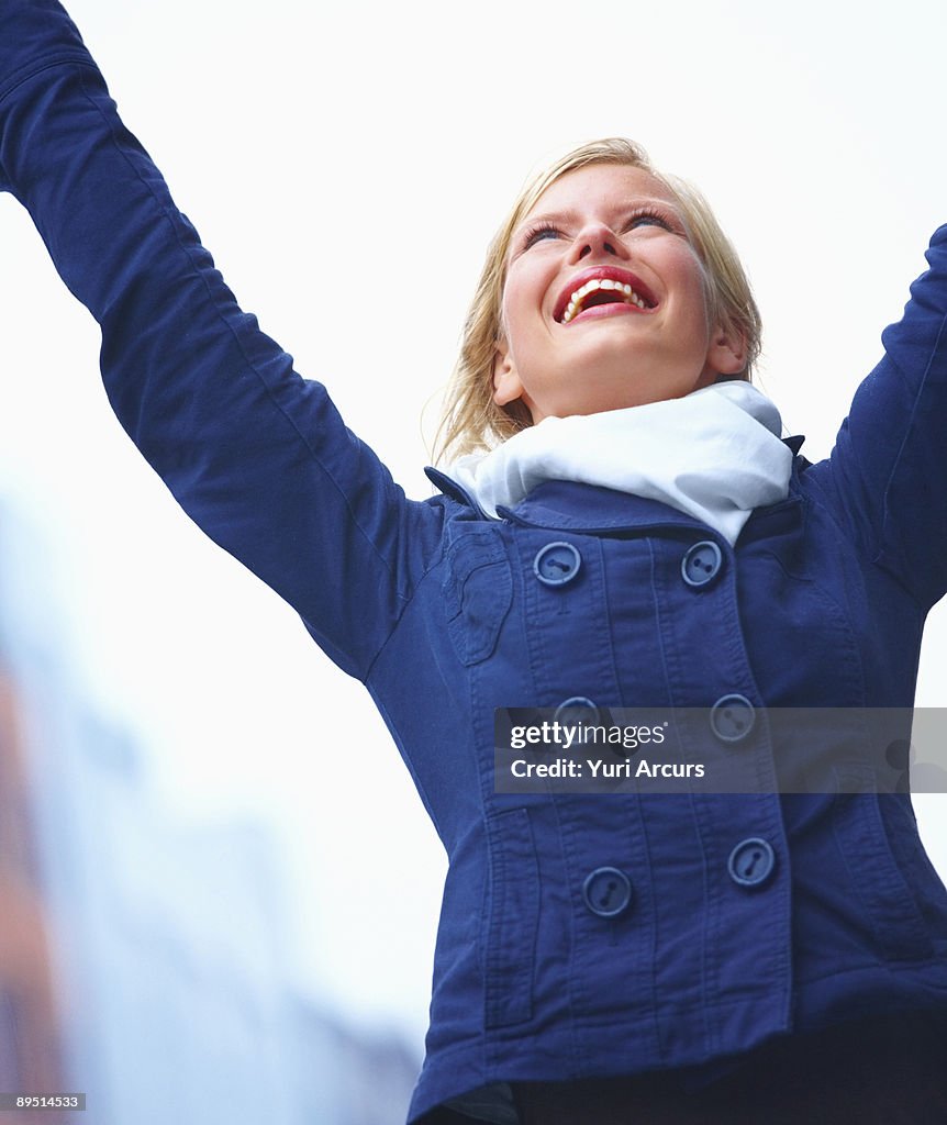  young beautiful girl looking towards sky