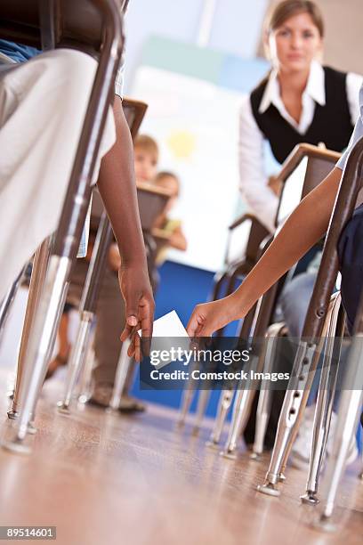 Passing Through Notes 102 Kid Passing Notes Stock Photos, High-Res Pictures, and Images ...