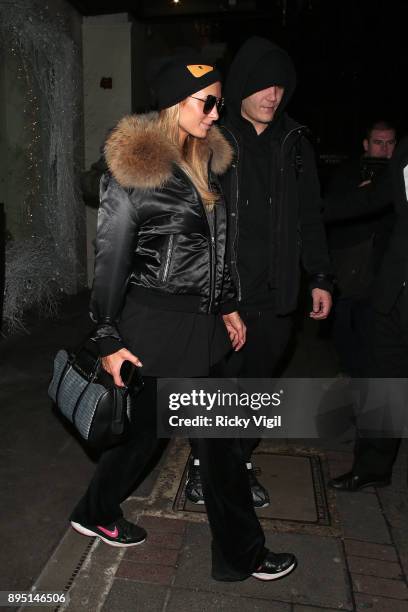 Paris Hilton and Chris Zylka seen leaving Mayfair hotel on December 18, 2017 in London, England.