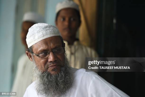 In this photograph taken on October 20 Myanmar Rohingya Islamic scholar Muhammed Hanif speaks during an interivew with AFP at a madrassa in the...