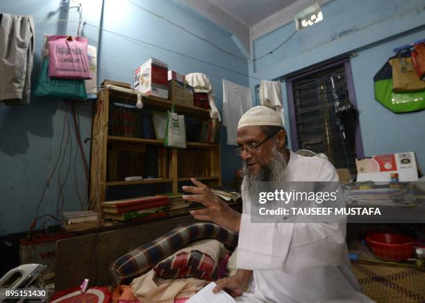 In this photograph taken on October 20 Myanmar Rohingya Islamic scholar Muhammed Hanif speaks during an interivew with AFP at a madrassa in the...