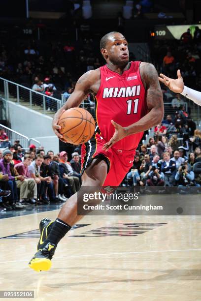 Dion Waiters of the Miami Heat drives to the basket against the Atlanta Hawks on December 18, 2017 at Philips Arena in Atlanta, Georgia. NOTE TO...