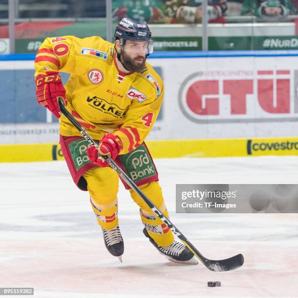 Henry Haase of Duesseldorfer EG controls the ball during the DEL match between Augsburger Panther and Duesseldorfer EG on December 15, 2017 in...