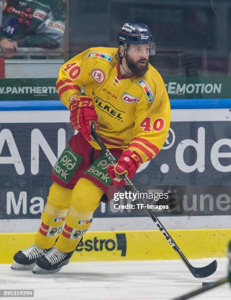 Henry Haase of Duesseldorfer EG controls the ball during the DEL match between Augsburger Panther and Duesseldorfer EG on December 15, 2017 in...