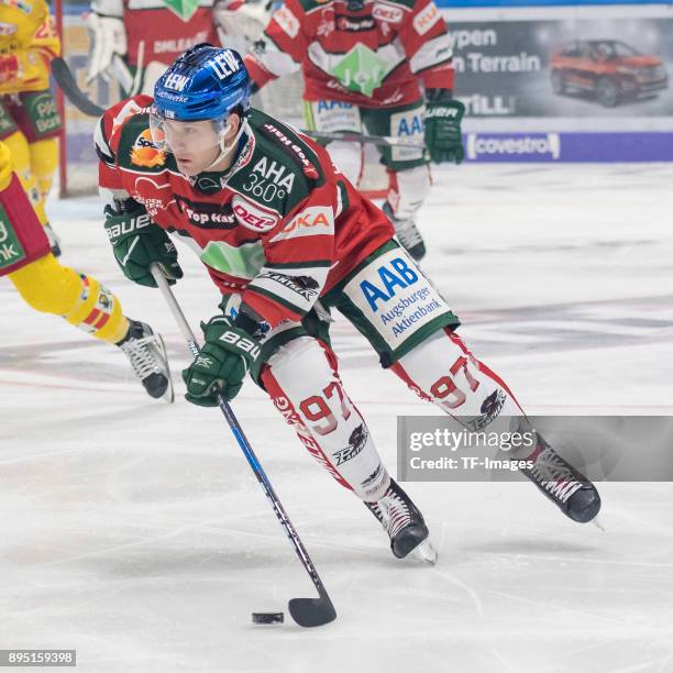 Matt White of Augsburger Panther controls the ball during the DEL match between Augsburger Panther and Duesseldorfer EG on December 15, 2017 in...