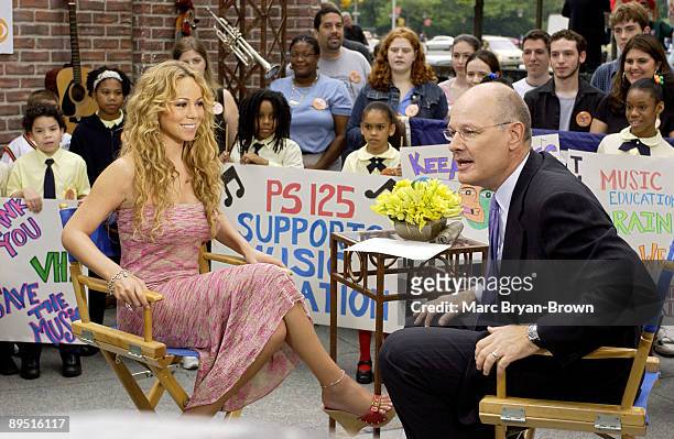 Mariah Carey with CBS's The Early Show Anchor Harry Smith